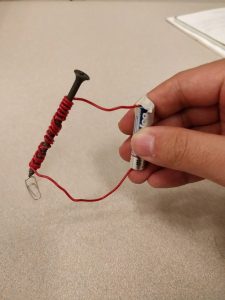 wire wrapped around a screw